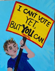 Youth with sign urging voting.