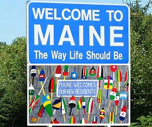 maine welcomes new residents with sign and lobster pots