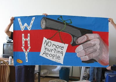 a hand gun with a red flag tied to the barrel reads No more hurting people and big word - WHY